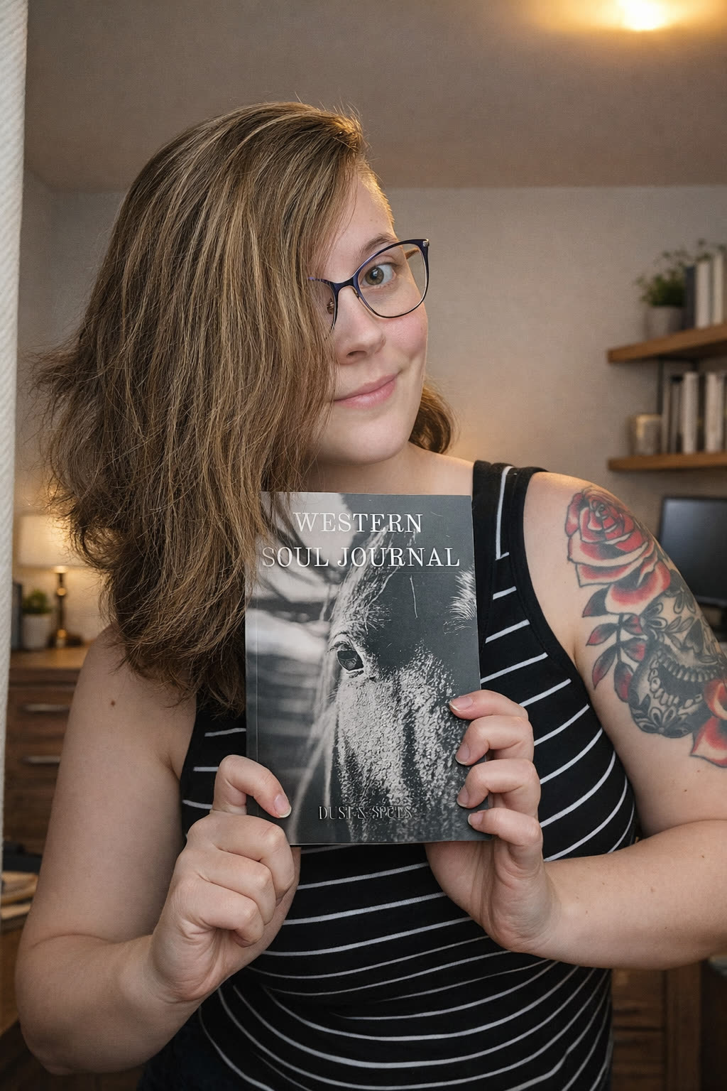 Alix holding the Western Soul Journal.